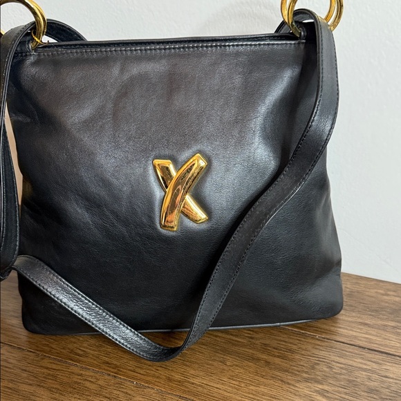Paloma Picasso Handbags - Paloma Picasso Black Leather Shoulder Bag with Gold Accent